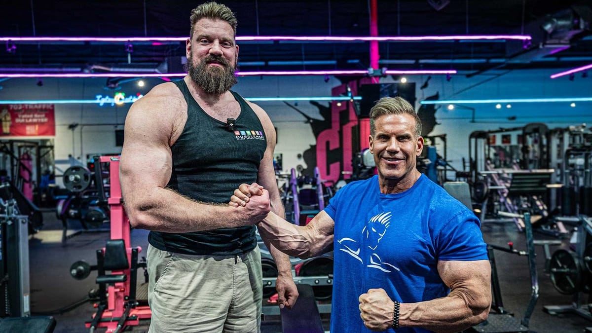 Olivier Richters shakes hands with four-time Mr. Olympia Jay Cutler in a neon-lit gym