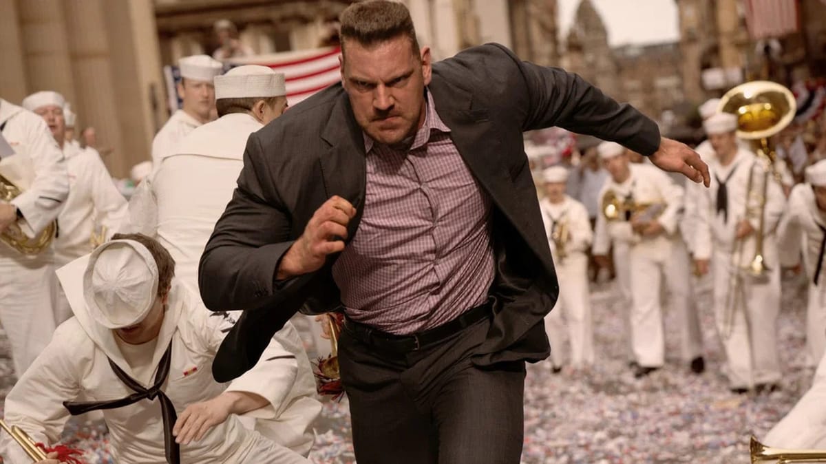 Indiana Jones and the Dial of Destiny: Olivier Richters as Hauke runs through a ticker-tape parade